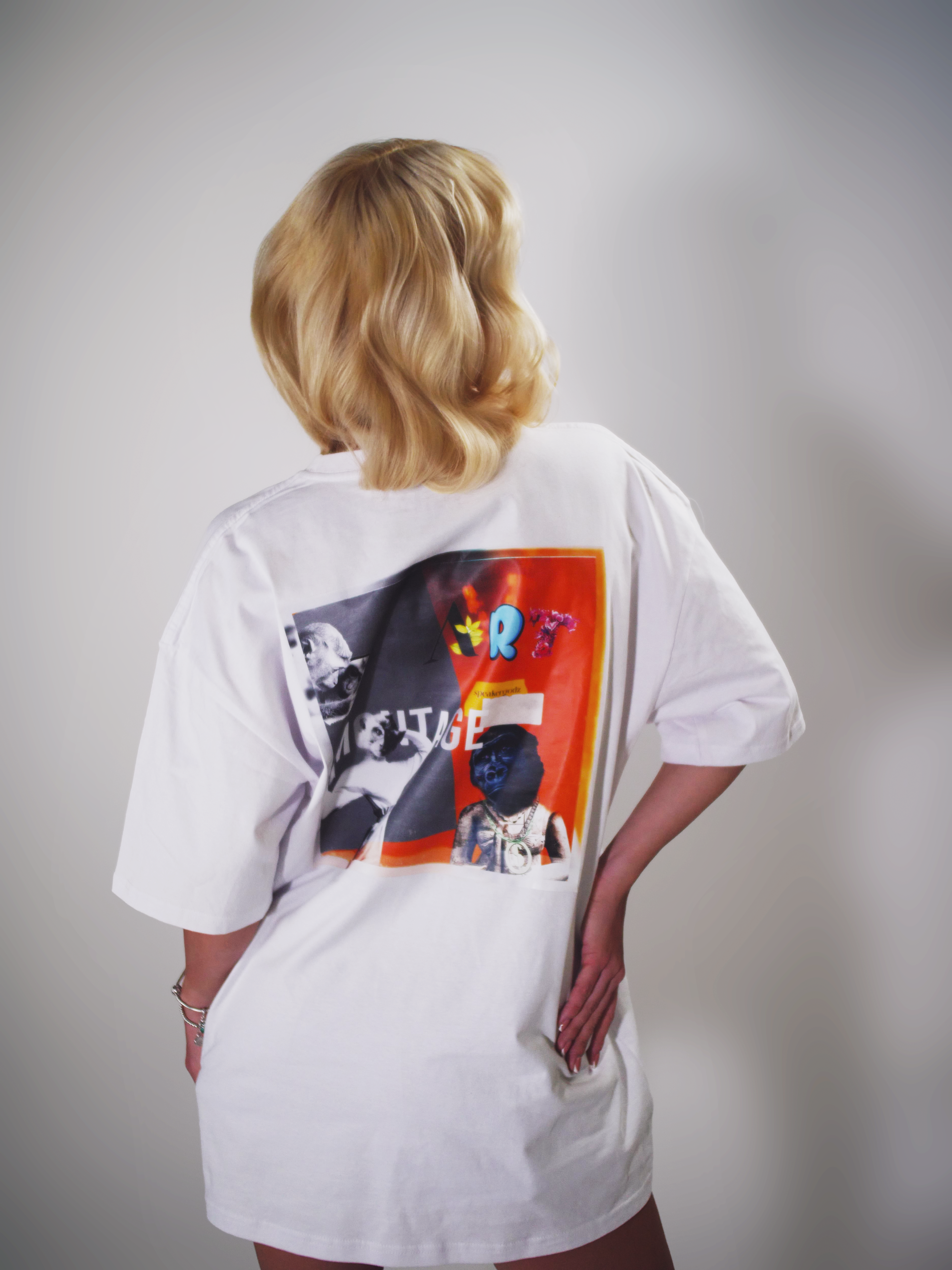 Montage Art Graphic T-Shirt — Retro Collage Art Tee with Small Heart Logo